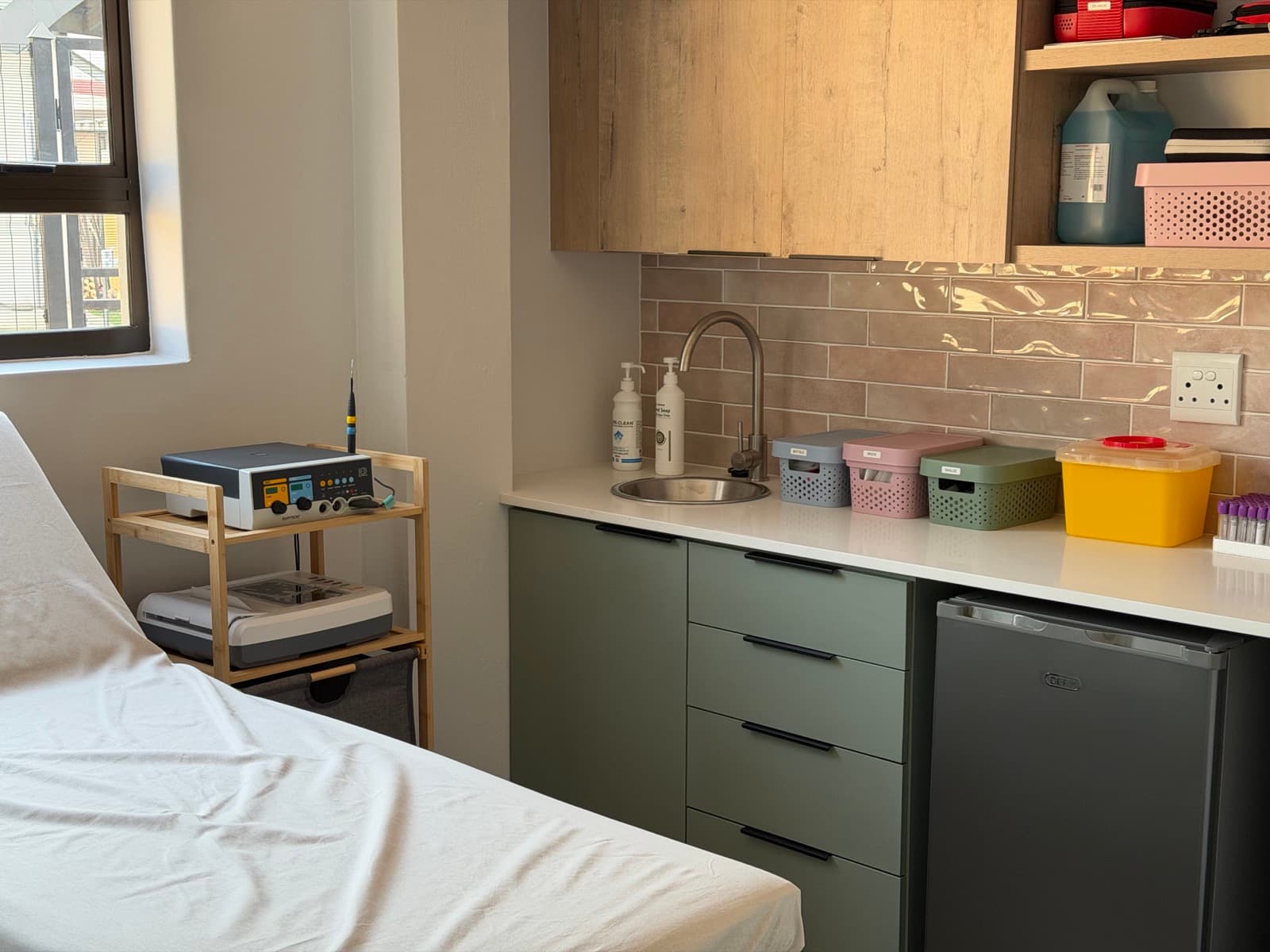 Modern procedure room with examination bed